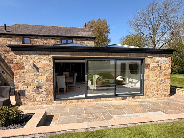 Stone Extension with Sliding Patio Doors