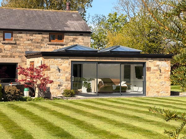 Stone Extension with Sliding Patio Doors