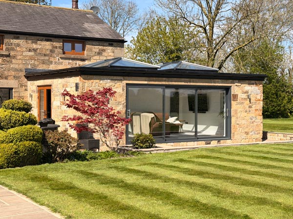 Stone Extension with Sliding Patio Doors